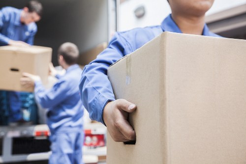 Professional house removals planning in Hatton with moving boxes and careful organisation